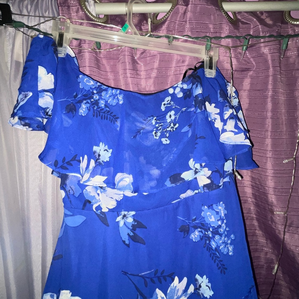 Long royal blue dress with a tail in the back. Size 5